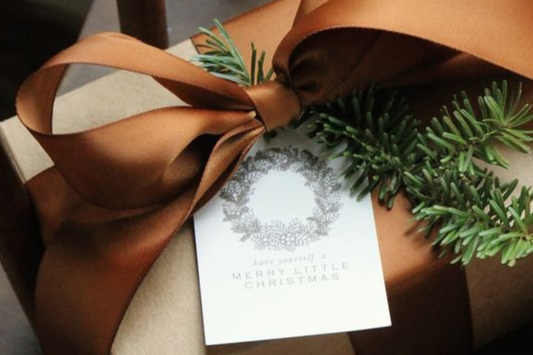 A collection of beautifully wrapped handmade holiday gifts with eco-friendly packaging